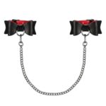 Manette con fiocco in ecopelle nera con catenella Obsessive